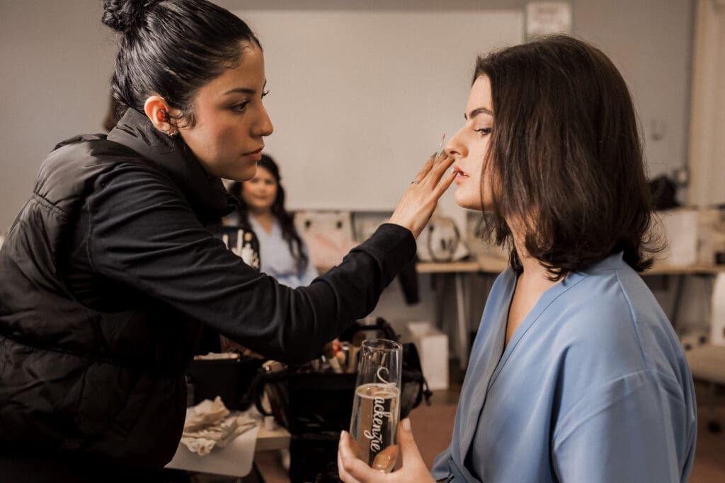 Windy City Glam makeup artist doing makeup on a bride