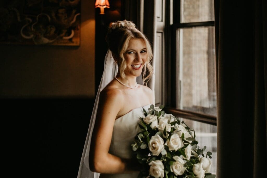Windy City Glam bridal hair and makeup featuring a blonde bride.