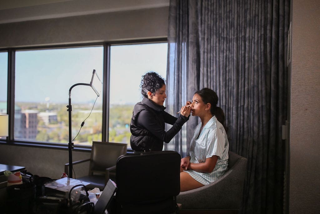 Bride getting her makeup