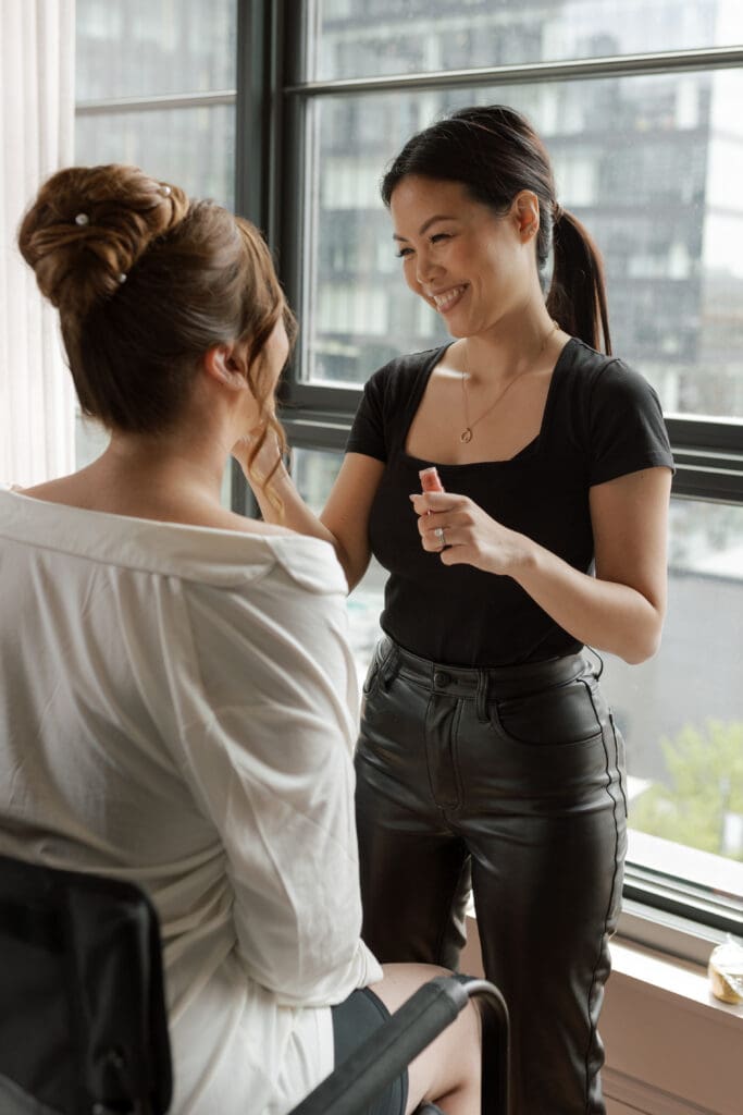 Windy Ciity Glam bride glam prep and makeup artist doing makeup.