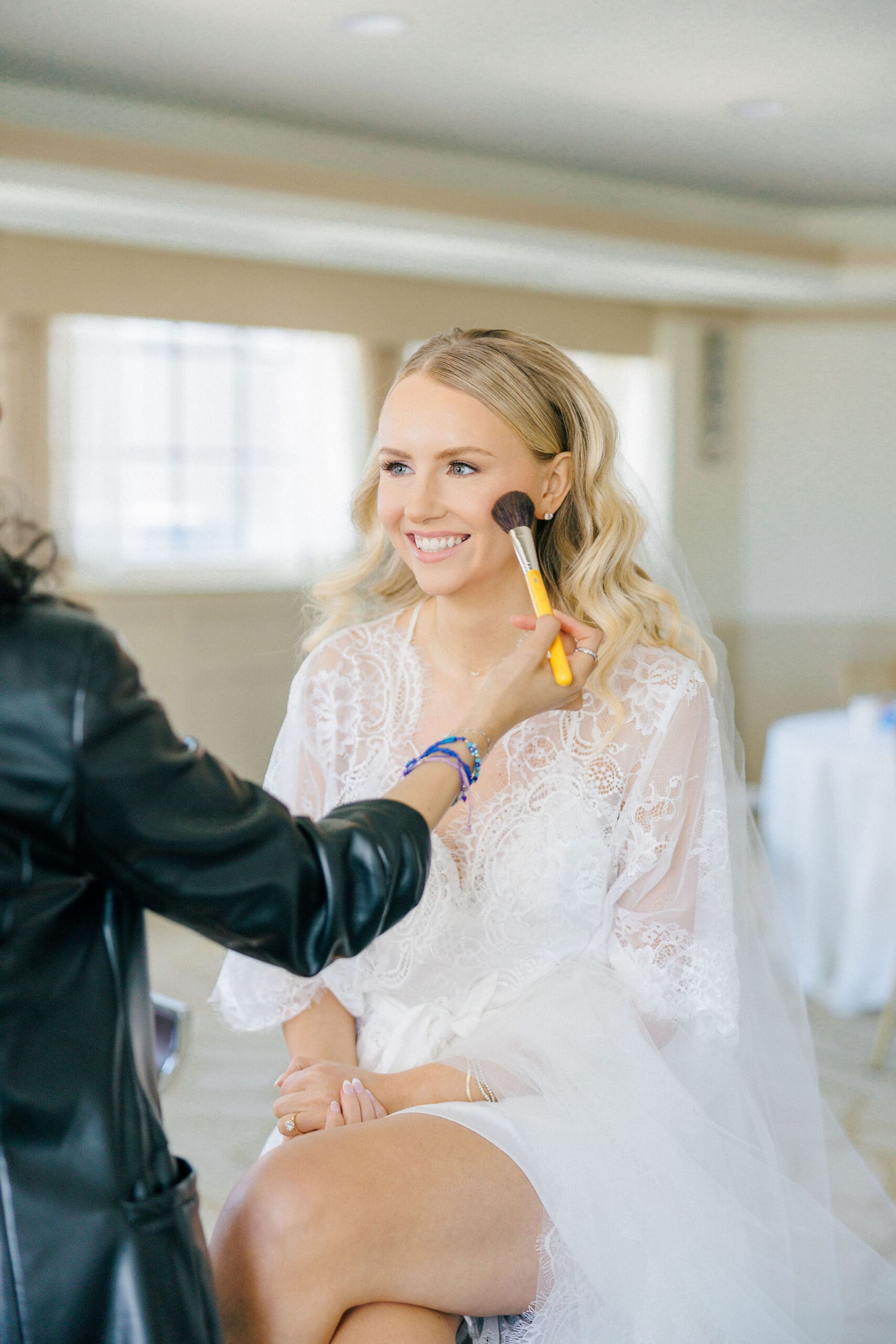 Bride getting her makeup