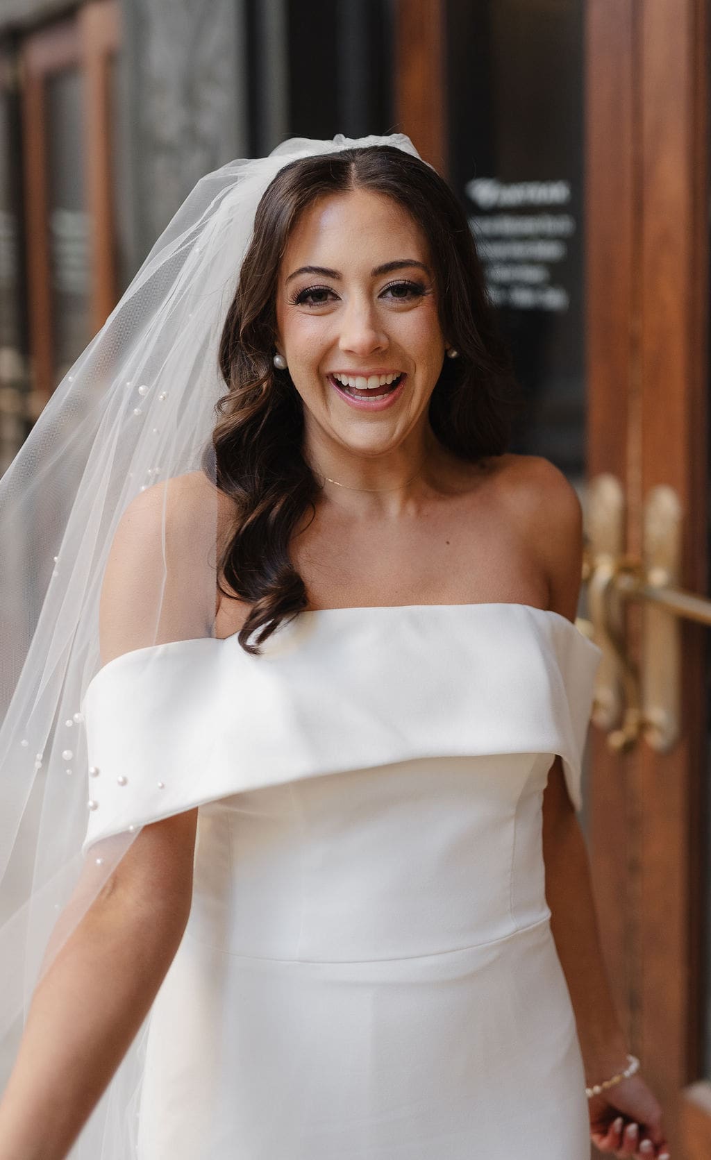 Happy bride wearing white gown