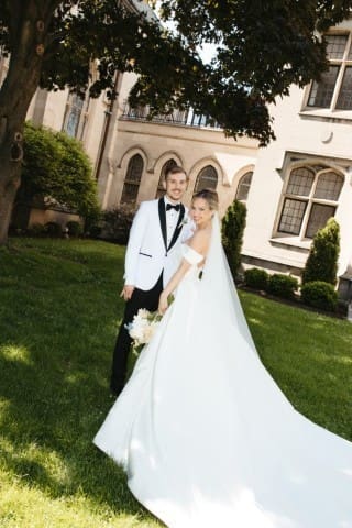 Bride and Groom posing for the camera.