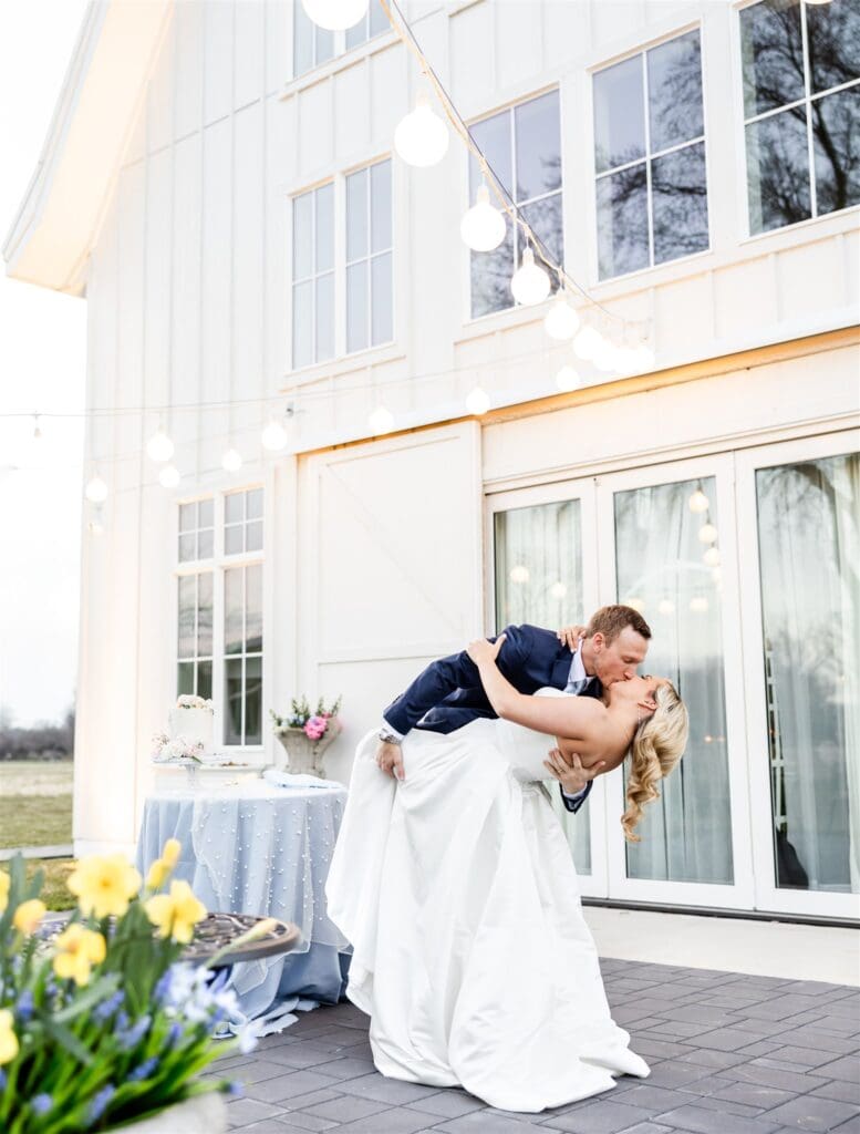 Bride and groom kissing 