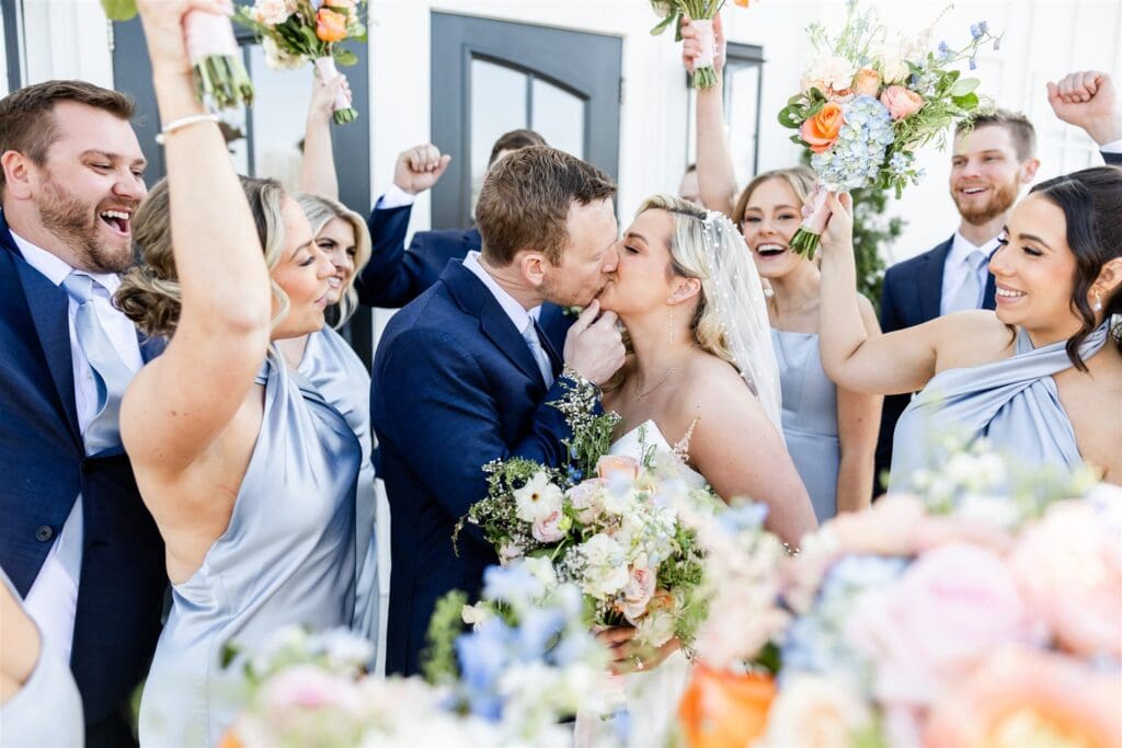 Bride and groom kissing
