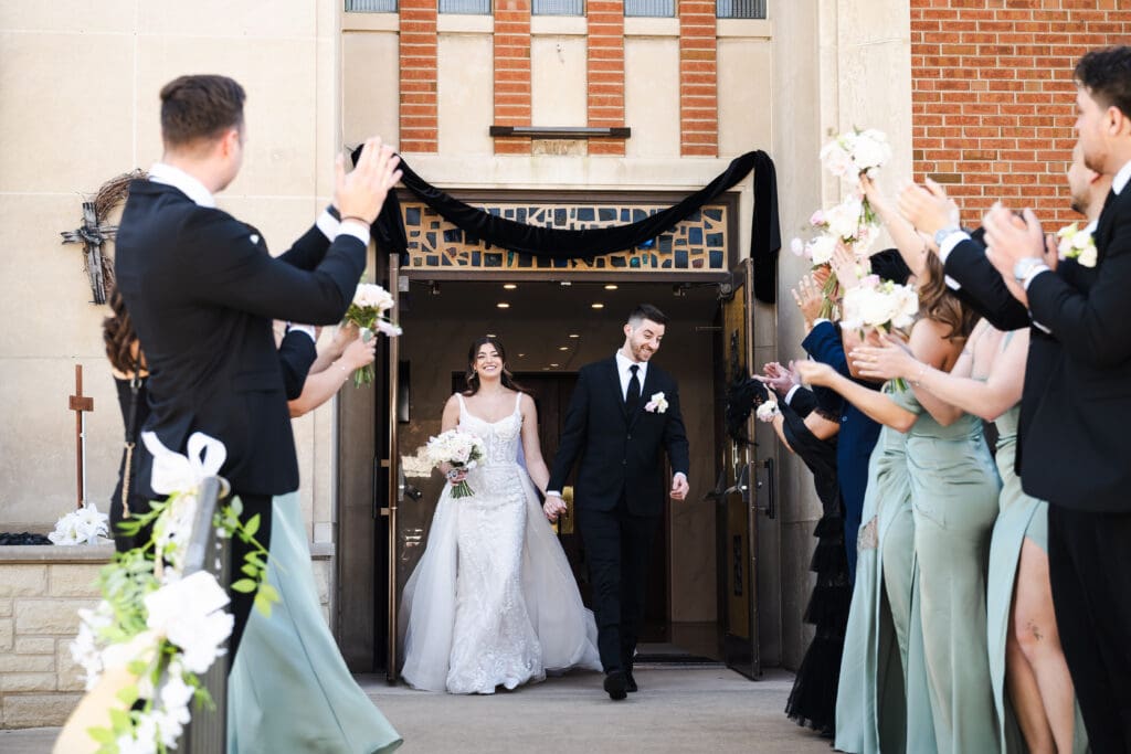 Bride and groom walking out.