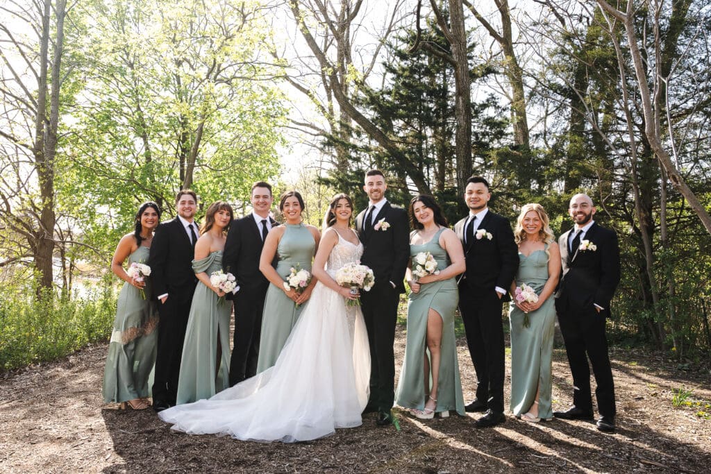 Bride and groom and their wedding entourage.