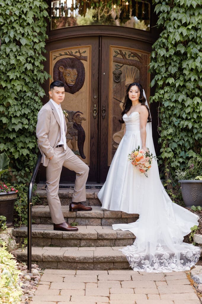 East Asian bride and groom posing for a portrait