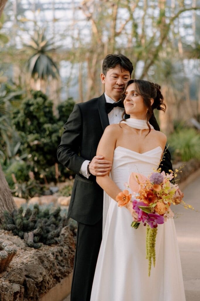 Chicago bride and groom posing for a photo on their wedding