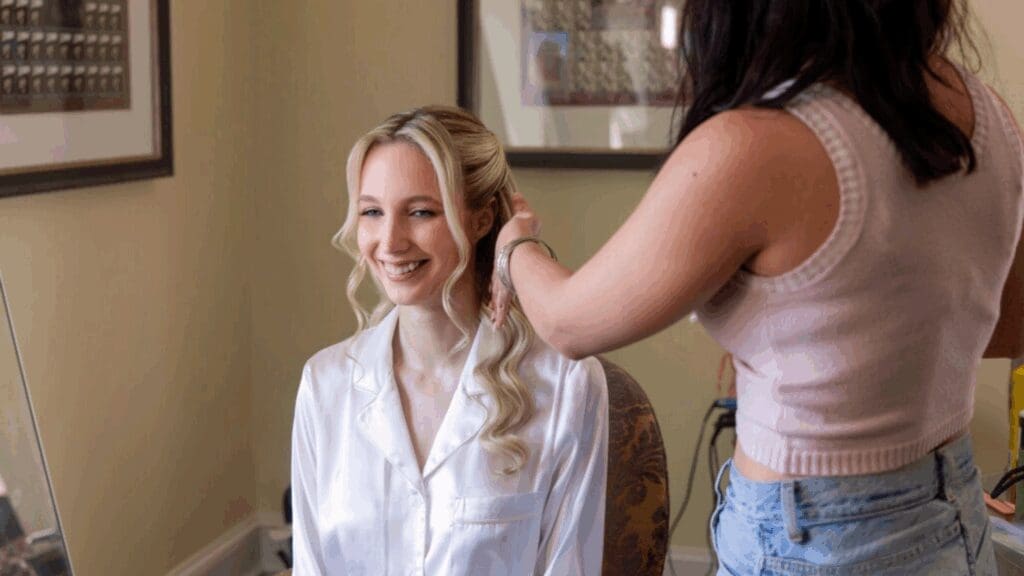 Bride getting her hair styled