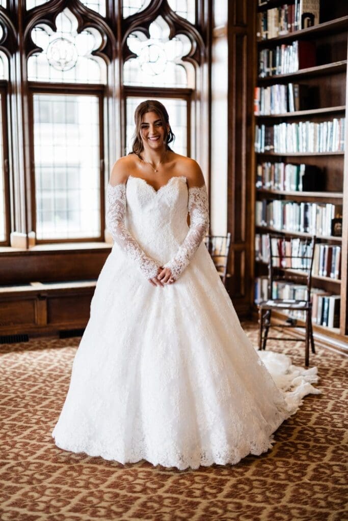 Chicago bride posing in classic bridal gown with soft glam makeup