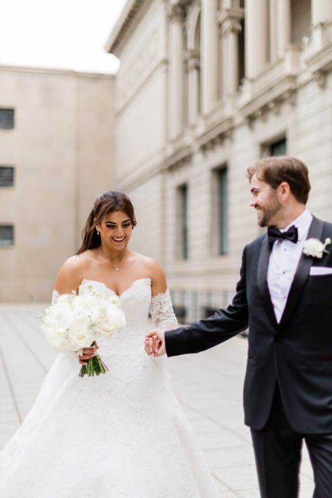 Chicago bride and groom holding hands