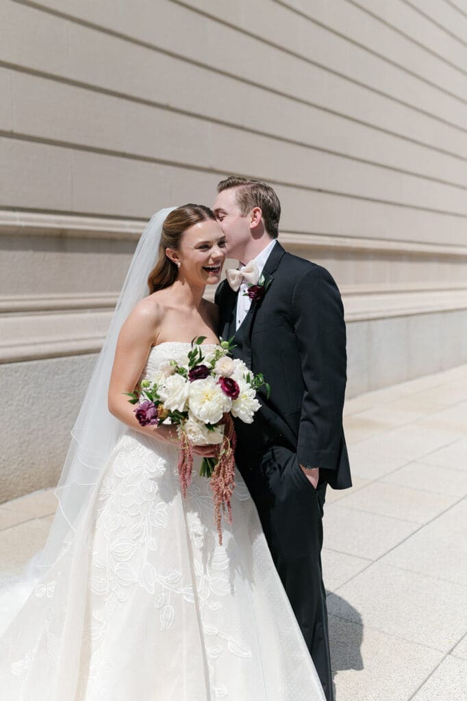 Bride and groom pose 