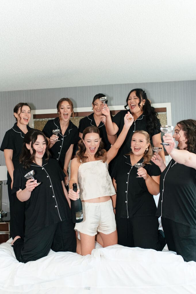Bride with her bridesmaids celebrating