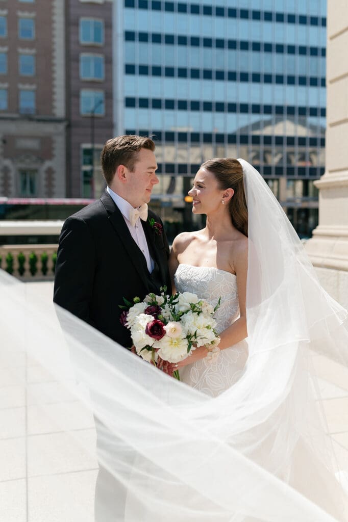 Bride and groom pose for the camera