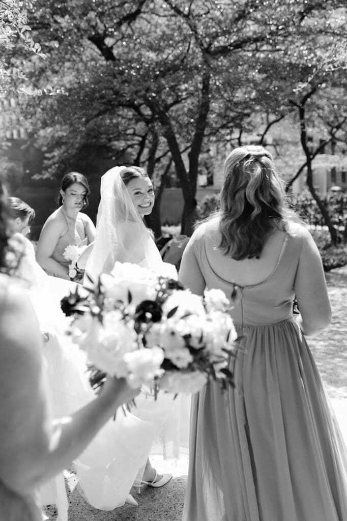 Bride and bridesmaids in a black and white photo