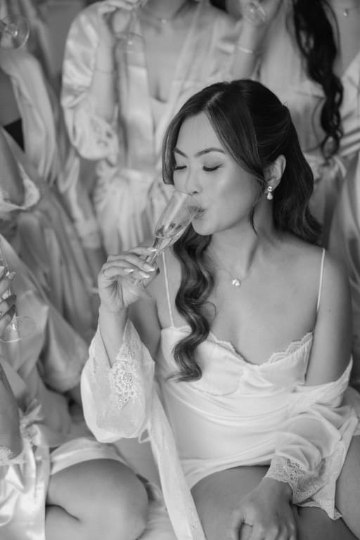 Chicago bride holding champagne.