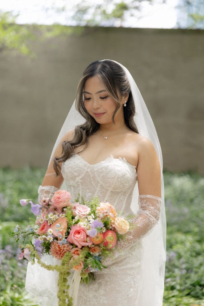 Chicago bride wearing wedding gown and holding a bouquet.