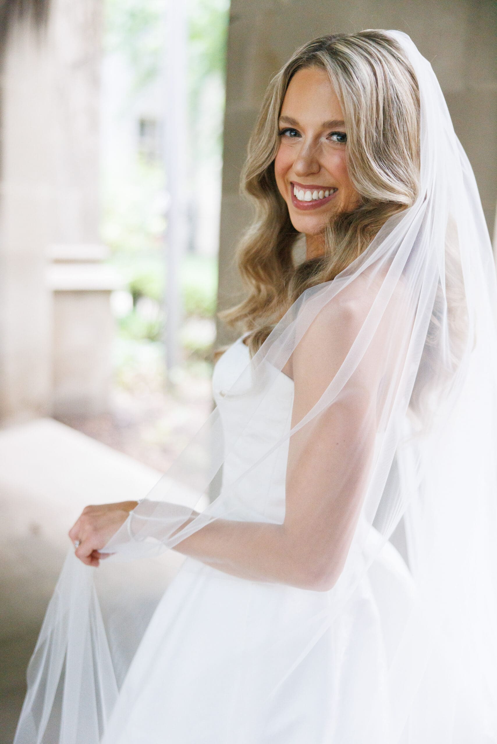 Chicago bride in soft glam and curled hair