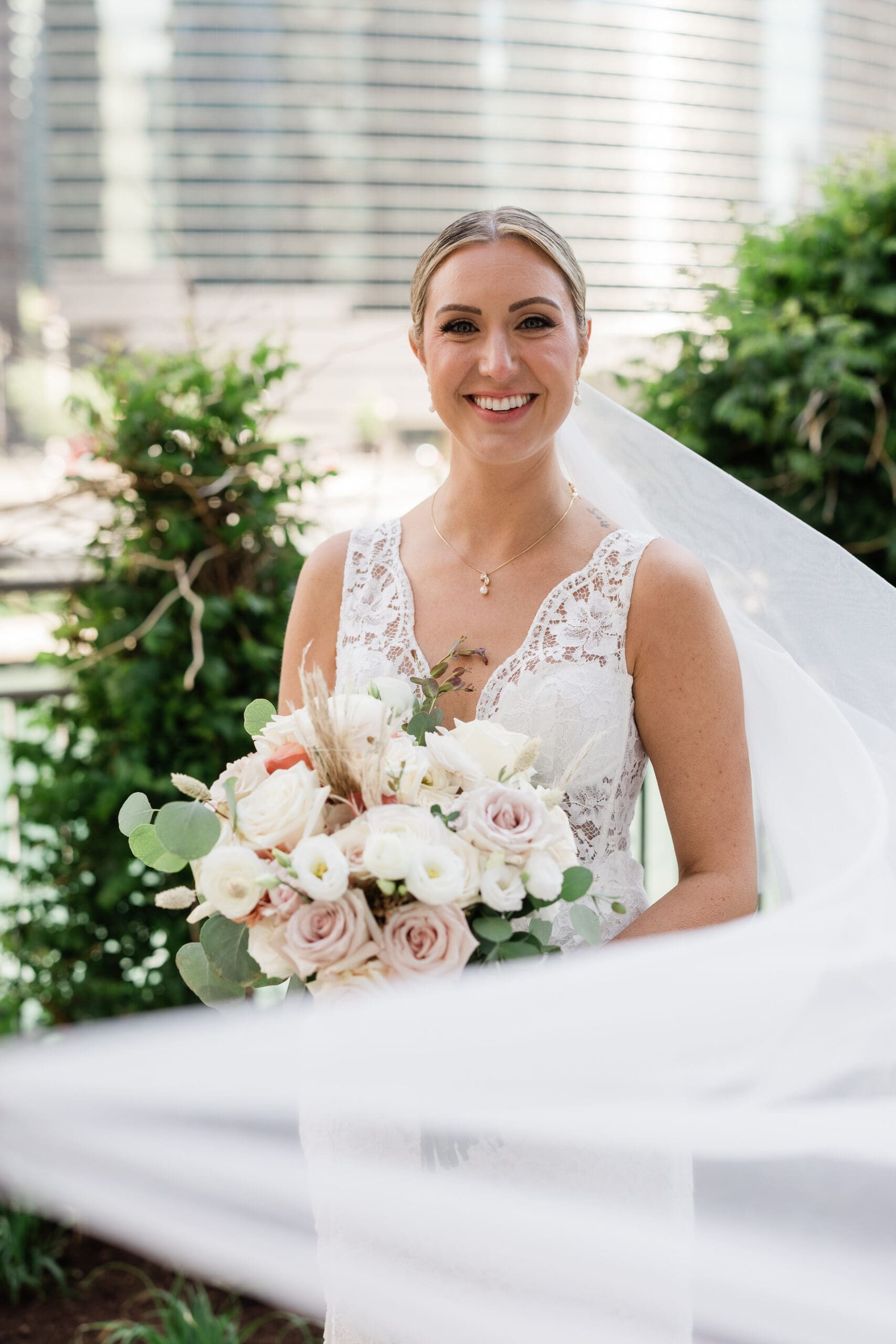 Nicole's Soft Glam Wedding Makeup and Low Bun Updo