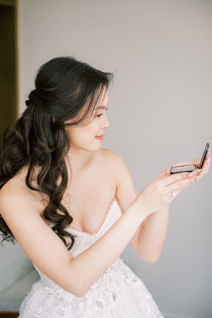 Asian bridal in soft glam makeup and half up half down
