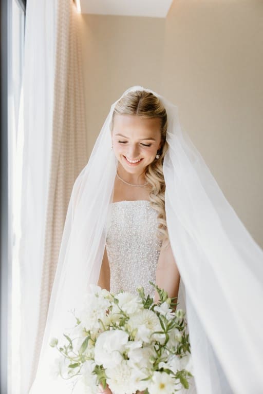 Chicago bride wearing wedding gown and holding a bouquet